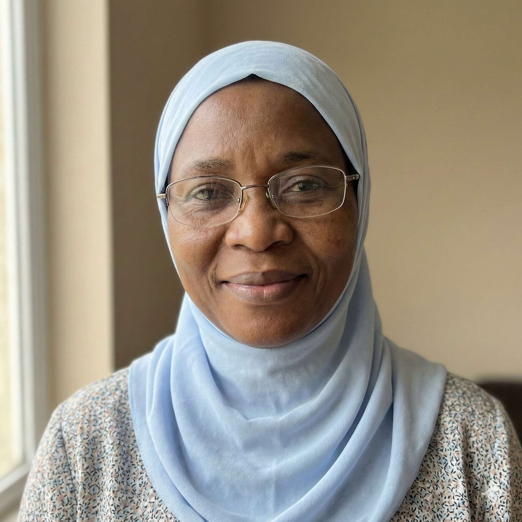 Mrs. Ibrahim, mother of a 14-year-old